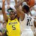 Michigan senior Eso Akunne guards Michigan State junior Keith Appling during the second half at Breslin Center in East Lansing on Tuesday, Feb. 12. Melanie Maxwell I AnnArbor.com